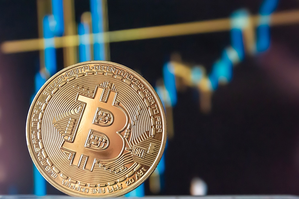 Cardano Creator Sets $100K Price Target for Bitcoin